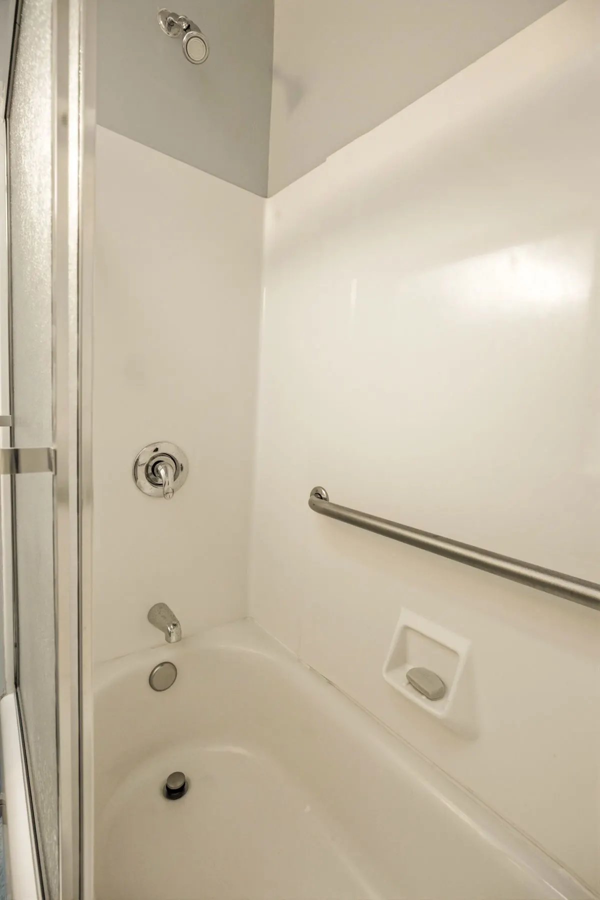 Fixed grab bar in the shower